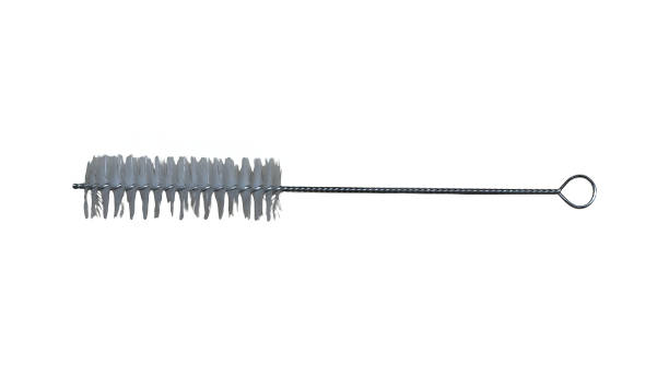 Studio shot of a slender bottle brush on a white background. The white nylon bristles and metal handle are designed for cleaning small spaces and narrow necks. A simple device for domestic hygiene and sanitation.