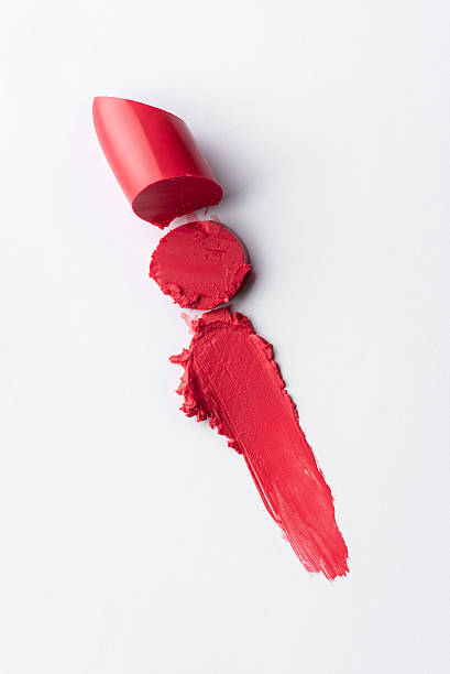 istock Red lipstick swatch smudged texture on white background 2198516227