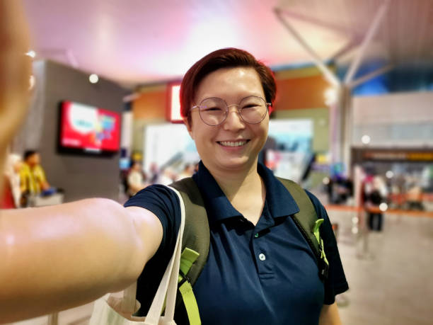 istock Asian Woman Travelling 2198520279