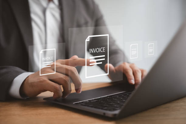 istock Digital online e-invoice businessman using laptop with invoice icon, e-tax, digital receipt. 2198524316