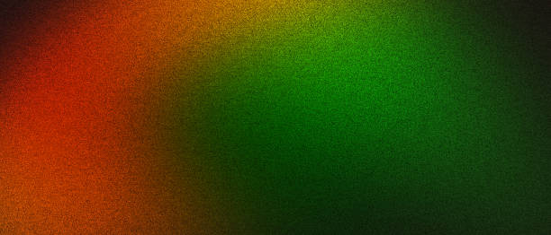 istock Colorful abstract gradient with red, orange, and green noise textured background 2198528058
