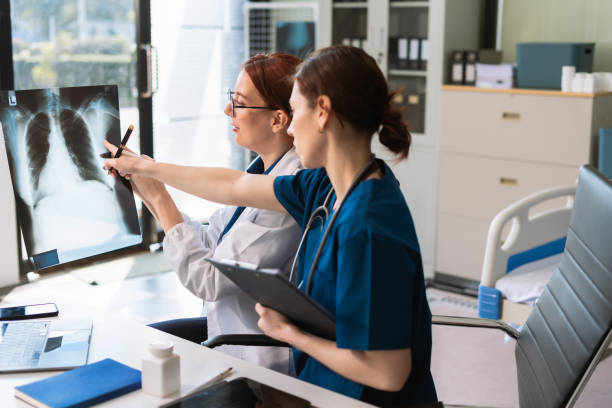 istock Medical Team Using Digital Tablet for Healthcare, Doctor Technology, X-Ray Analysis. 2198531346
