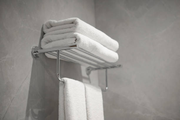 istock White towels in hotel bathroom, spa resort. 2198531658