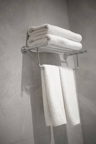 istock White towels in hotel bathroom, spa resort. 2198531663