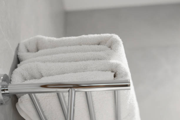 istock White towels in hotel bathroom, spa resort. 2198531664