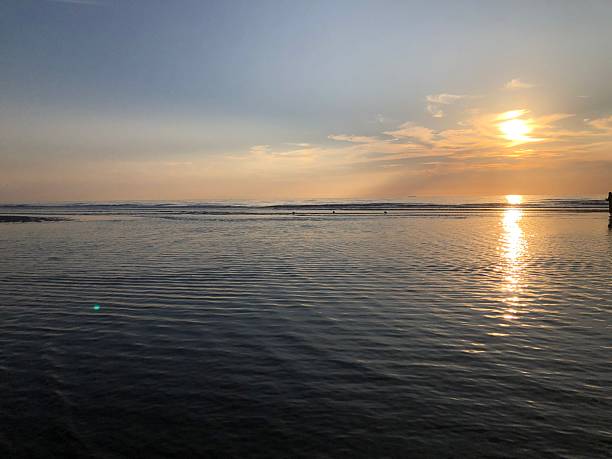 istock Sunset on the calm sea 2198532440