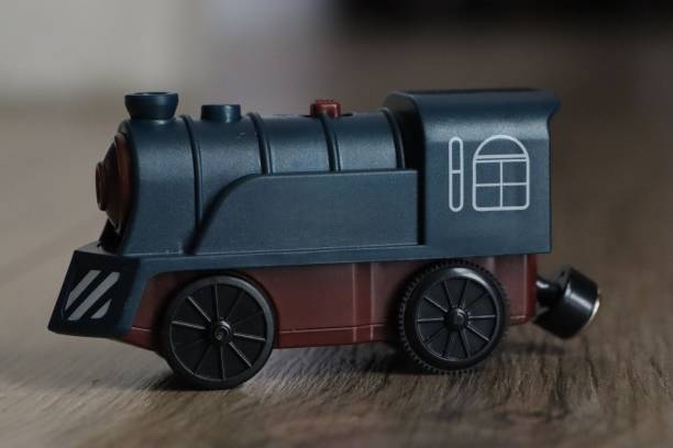 istock Vintage Toy Train A classic wooden engine that embodies a nostalgic childhood experience 2198539494
