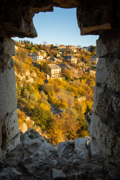 istock View from Ruins Framing a Serene Village Landscape 2198542081