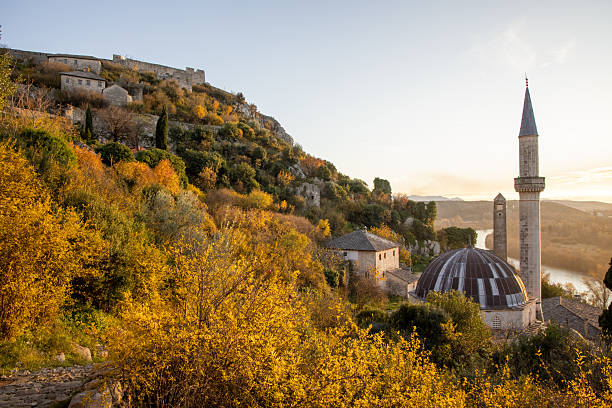 istock Captivating Sunset Over Mosque Amidst Autumn Foliage 2198544064