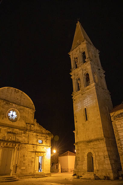 istock Illuminated Historical Church Tower at Night 2198544803