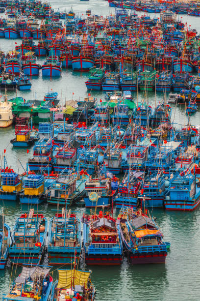 istock Fishing boats are nailing on the river 2198544860