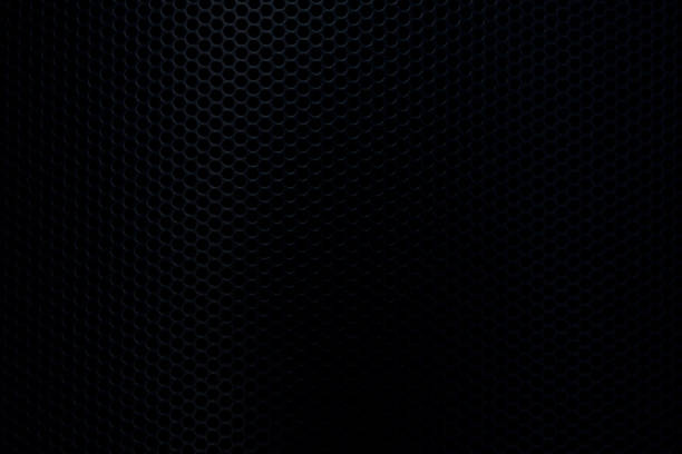 istock Close-up macro of black speaker vent background,grille and speaker texture. grille and speaker background. musical background. dj background. soft focus 2198544924