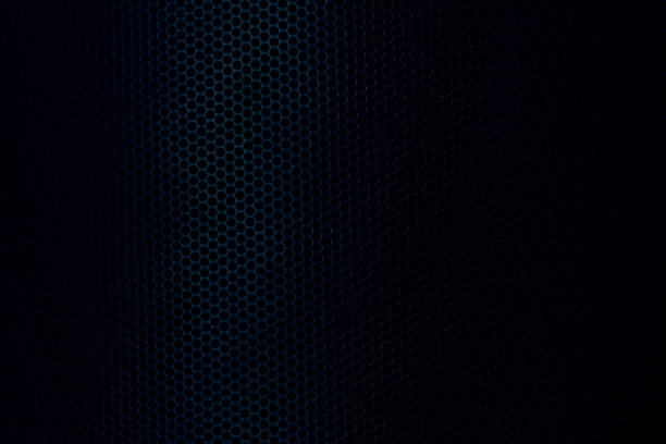 Close-up macro of black speaker vent background,grille and speaker texture. grille and speaker background. musical background. dj background. soft focus