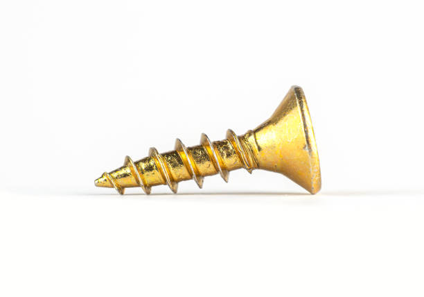Close-Up Of Screw On Wood