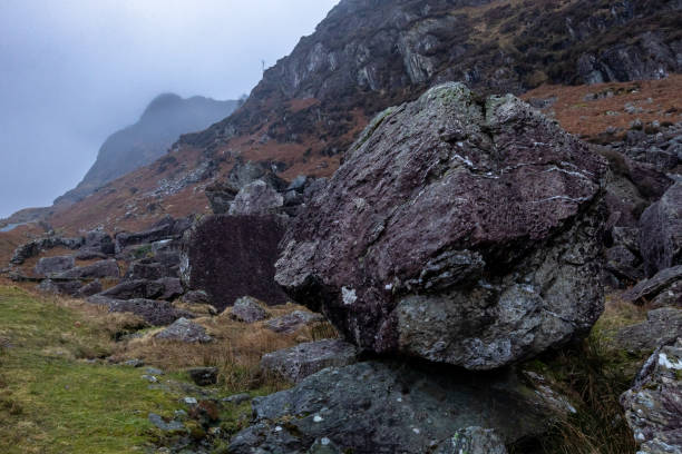 istock Rocks on mountainside in Moelwyn range on misty day, Tanygrisiau, Blaenau Ffestiniog, Gwynedd, Snowdonia National Park, Wales, Britain 2198546244