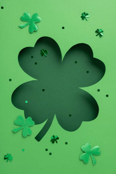 istock Bright vertical green clover imagery featuring cutout and embellishments, symbolizing luck and celebration for Saint Patrick's Day emphasizing Irish traditions with beautiful festive colors and design 2198550772