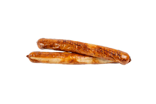istock Two grilled sausages on a white background. They are brown and have a texture 2198553585