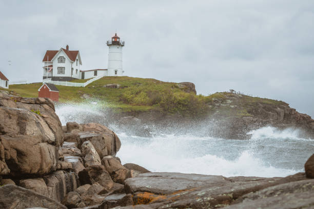 Located on Cape Neddick Nubble Island off the coast of York, Maine, the iconic “Nubble Light” is one of the most photographed lighthouses in New England.