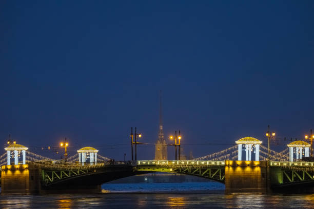 January 3, 2025, Russia, Saint Petersburg, View of the Palace Bridge decorated for Christmas and the Peter and Paul Fortress.