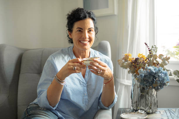 istock Mid adult woman at home 2198560523