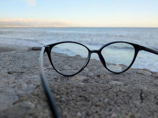 istock Glasses placed by the sea seaside 2198561712