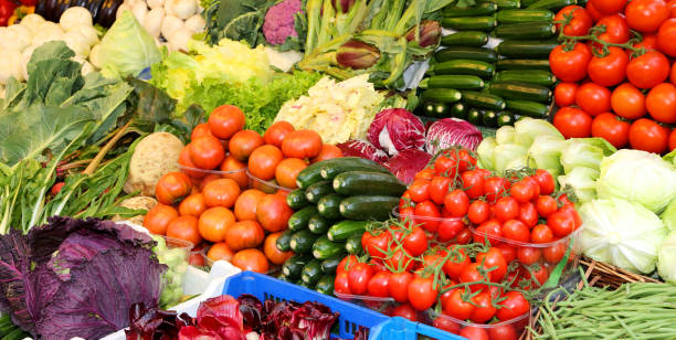 istock many fresh vegetables and fruits for sale 2198567207