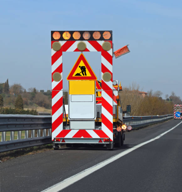 istock Traffic sign on the road with text Men at Work 2198567221