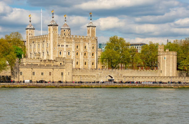 istock Tower of London in spring along Thames river, UK 2198578750