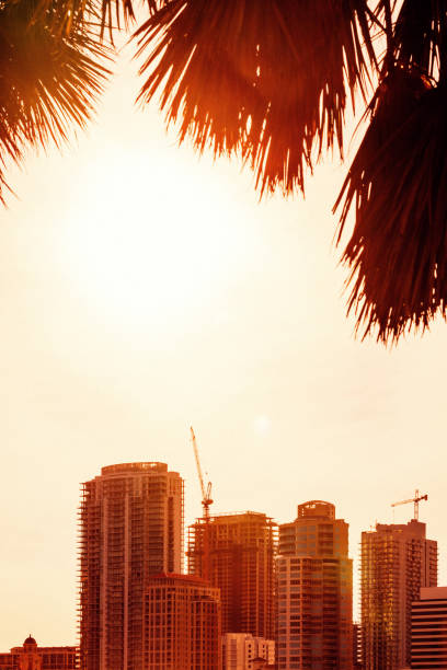 Crane truck working in construction site with sky background. Crane against sky. Crane, Construction background, construction equipment crane background.