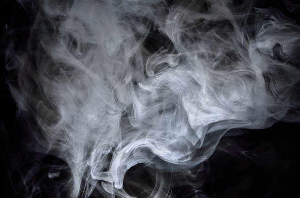 Abstract smoke background with dynamic swirls and motion effect Abstract smoke background with dynamic swirls and motion effect electronic cigarette smoke stock pictures, royalty-free photos & images
