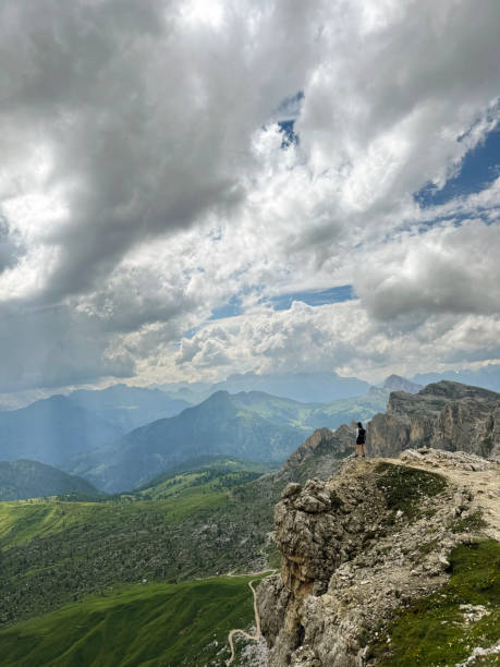 istock Hiking Adventure on Mountain Summit with Scenic Valley and Cloudy Sky 2198586632