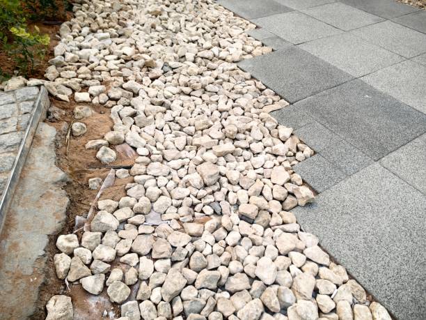 istock Stone gravel alongside the sidewalk. 2198588764