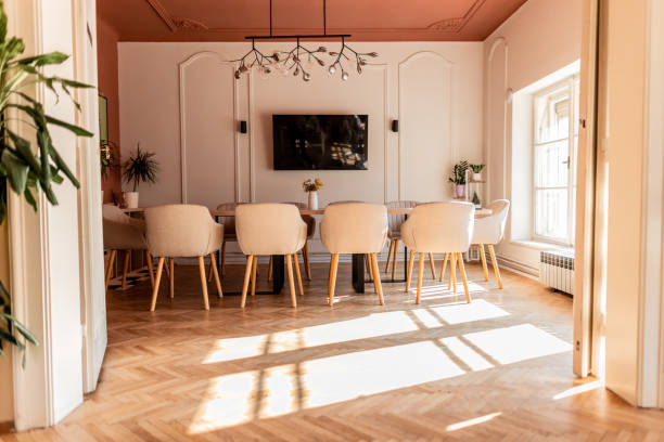 istock Sunlight illuminating modern meeting room with herringbone parquet 2198589501
