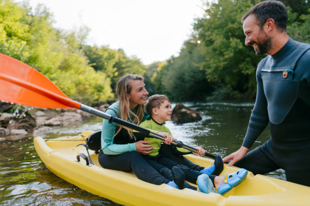 istock Family kayaking on the river 2198590611
