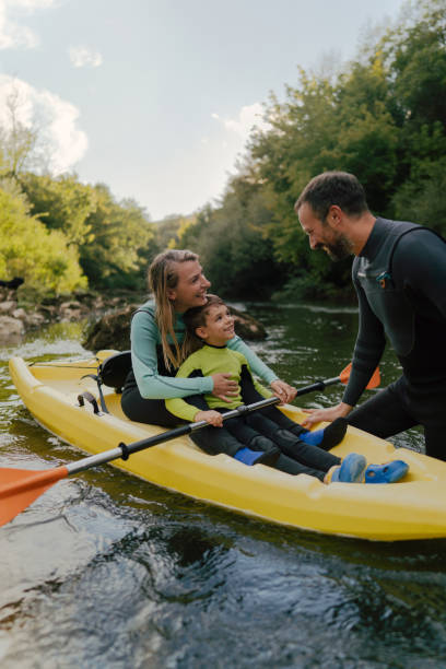 istock Family kayaking on the river 2198590612