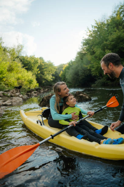 istock Family kayaking on the river 2198590613