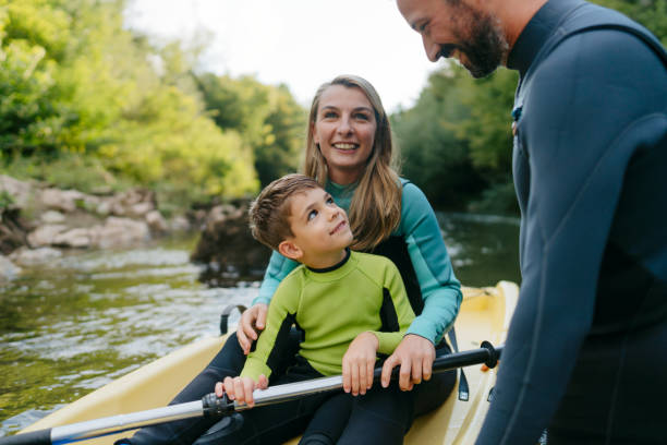 istock Family kayaking on the river 2198590644