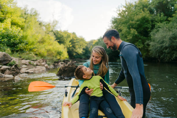 istock Family kayaking on the river 2198590684