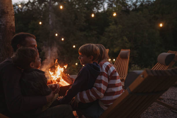 istock Family by the campfire 2198593589