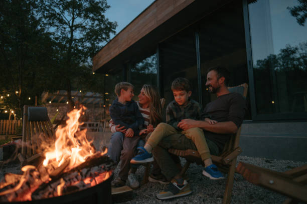 istock Family by the campfire 2198593830