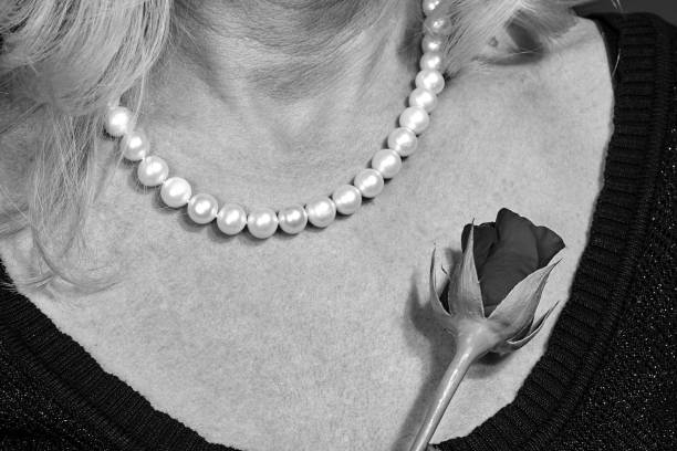 Beautiful pink roses with pearls toned in instagram style can use as wedding background. Soft focus.