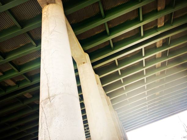 Concrete Columns and Green Highway Trusses