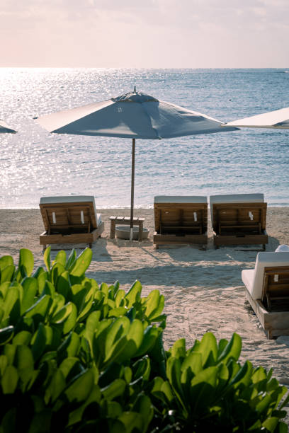 istock Sunrise at the beach in beautiful luxury resort 2198599031