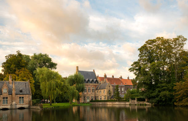 istock Historic architecture and serene waters in Brugge at sunset 2198600293