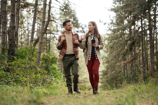 istock Beautiful young couple exploring nature 2198600417