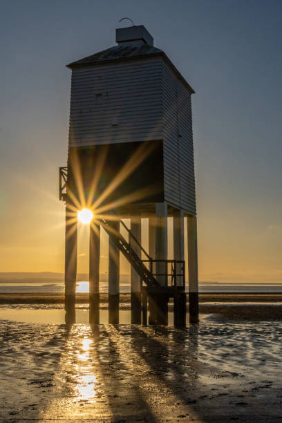 istock Sun shines through legs of Burnham-on-Sea Low Lighthouse 2198600457