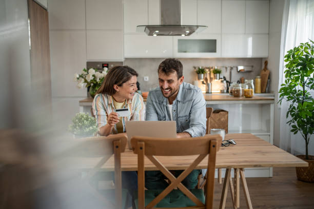 Couple booking their dream destination online