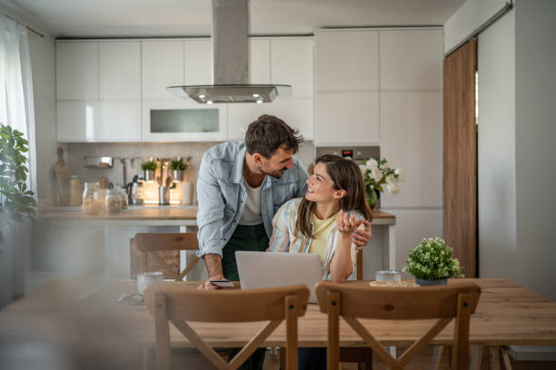 istock Young couple browsing and buying online 2198600553