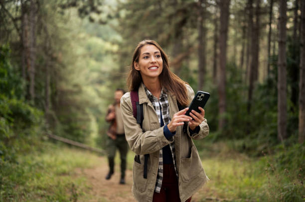 istock Beautiful young couple exploring nature 2198600702