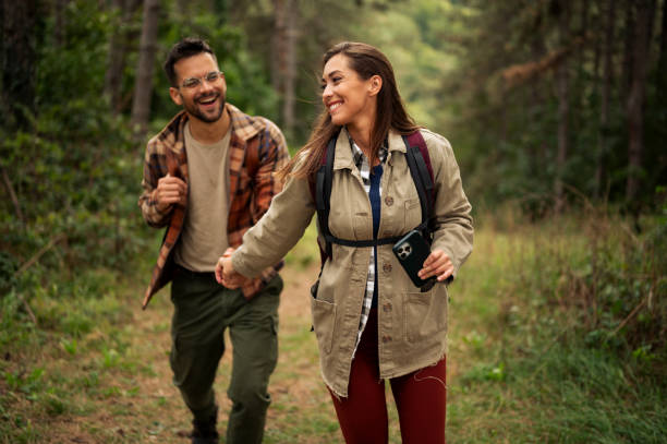 istock Beautiful young couple exploring nature 2198601269
